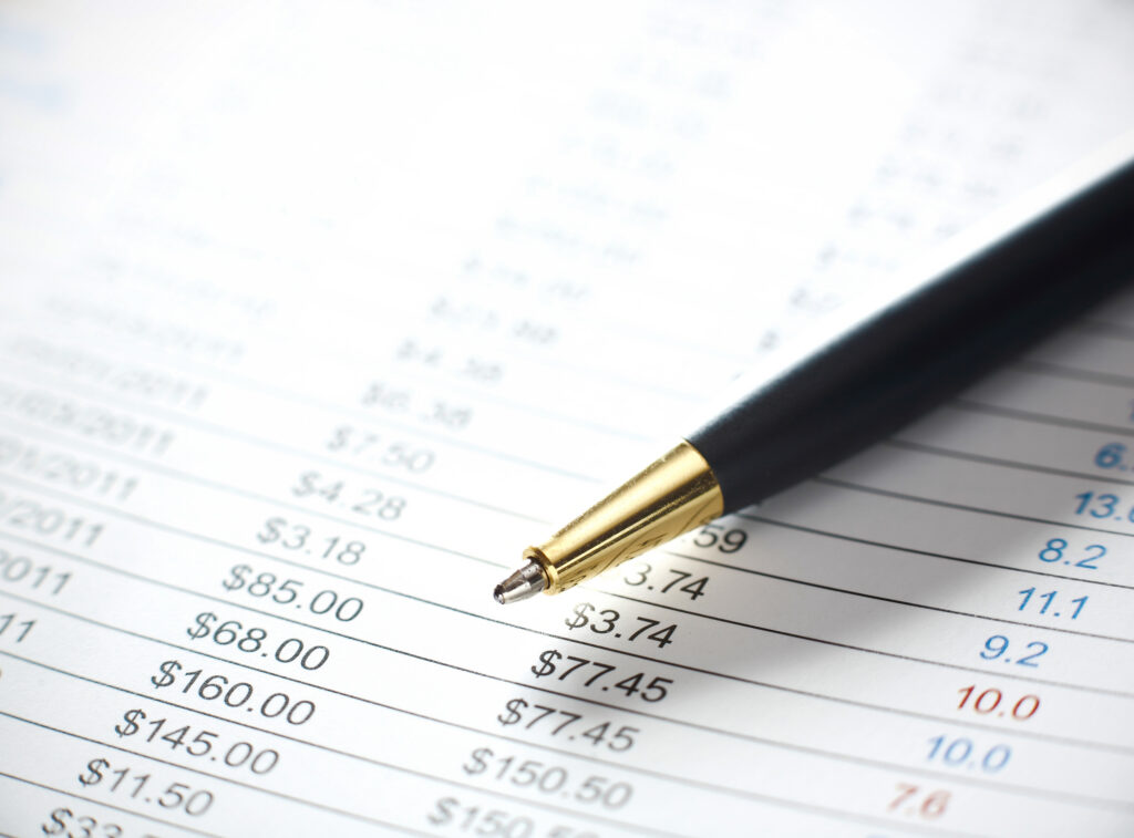Financial Statement With Pen For Business Use